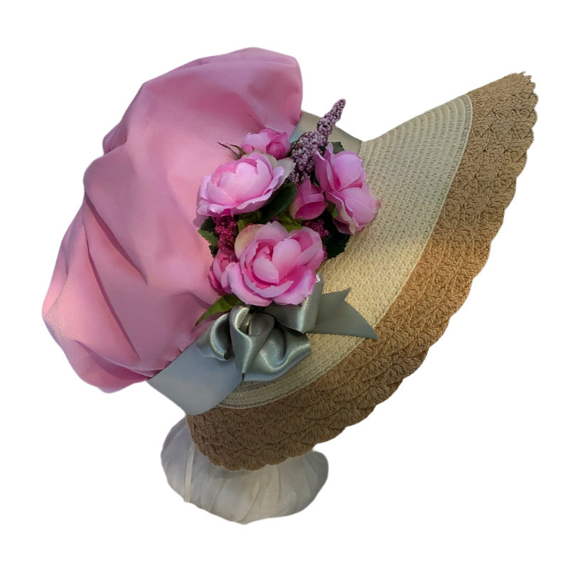 Pink cotton fabric, satin ribbon and pink roses complete this spring or summer regency bonnet