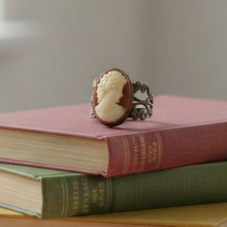 vintage cameo in bronze tone ring setting 