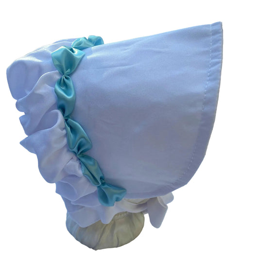 white prairie bonnet with blue ribbon
